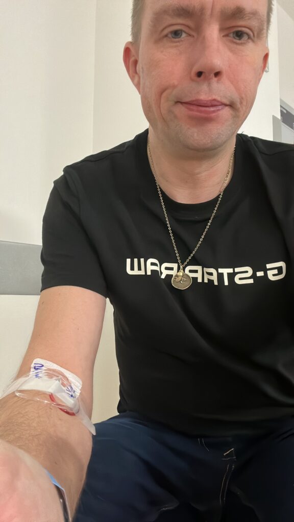 Stepan Hlucháň with a cannula in his arm in the emergency department, 9 November 2025